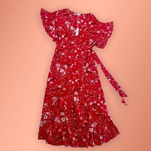 Perfect for a Christmas Party! Is a Max Studio wrap around red dress.